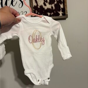 White Baby Onesie with Pink and Gold Embroidery